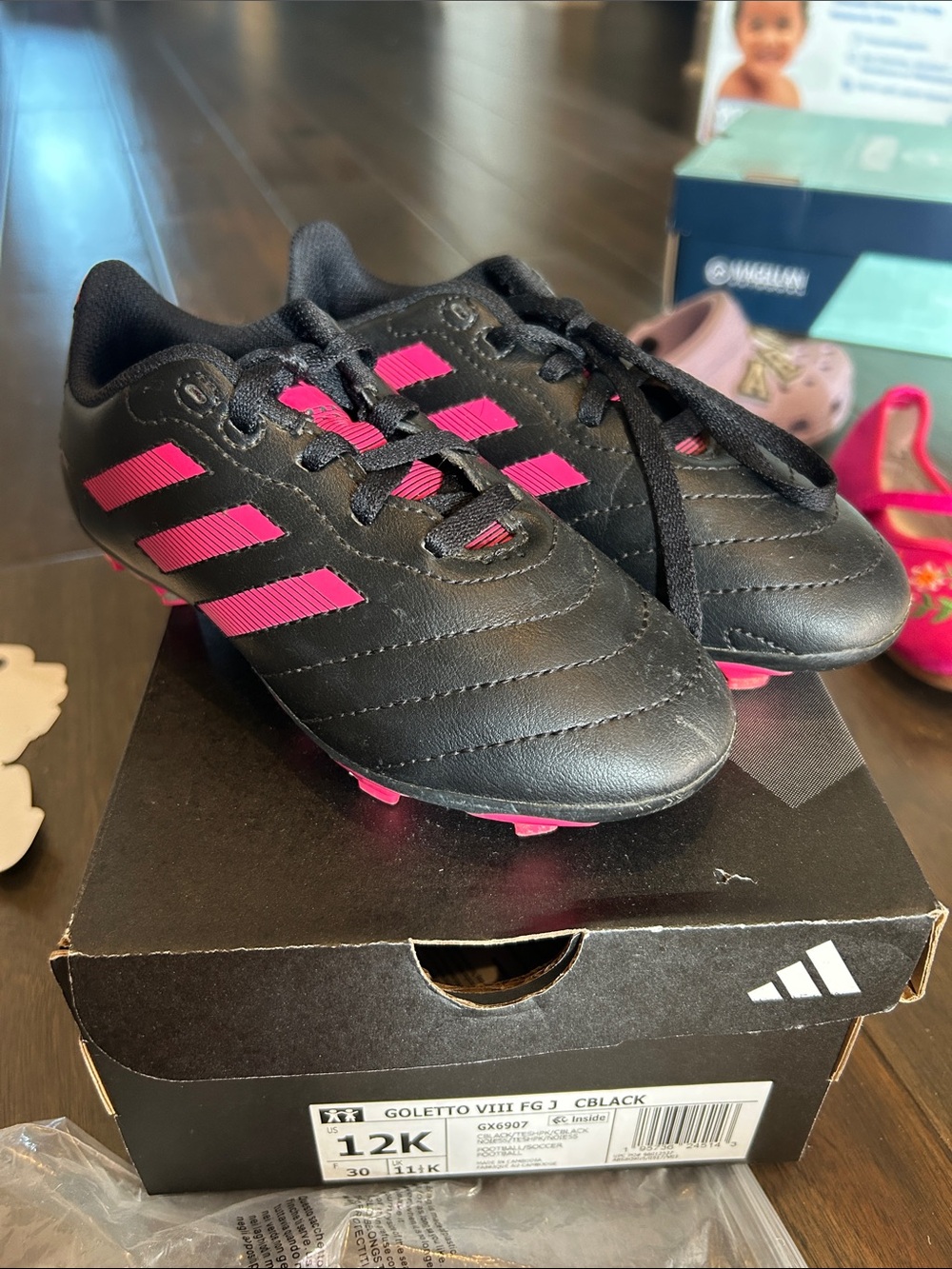adidas Black Soccer Cleats with Pink Stripes